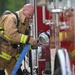 Firefighters face the flames