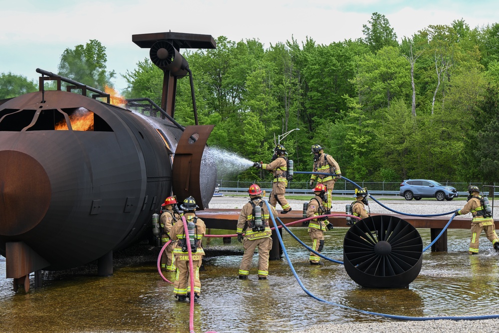 Firefighters face the flames
