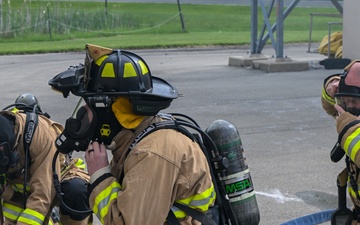 Firefighters face the flames