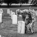 U.S. Army Soldiers assigned to the 3d U.S. Infantry Regiment (The Old Guard), participate in Flags In at Arlington National Cemetery