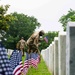 U.S. Army Soldiers assigned to the 3d U.S. Infantry Regiment (The Old Guard), participate in Flags In at Arlington National Cemetery