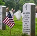 U.S. Army Soldiers assigned to the 3d U.S. Infantry Regiment (The Old Guard), participate in Flags In at Arlington National Cemetery