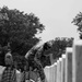 U.S. Army Soldiers assigned to the 3d U.S. Infantry Regiment (The Old Guard), participate in Flags In at Arlington National Cemetery.