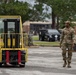 23 LRS Deployment and Distribution Team offloads deployment cargo