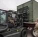 23 LRS Deployment and Distribution Team offloads deployment cargo