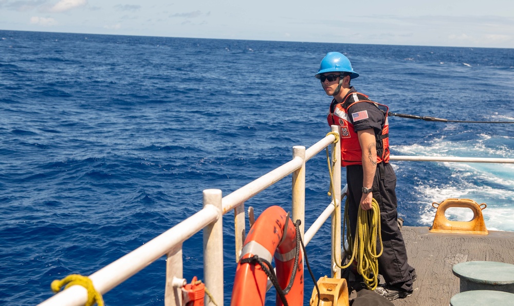 U.S. Coast Guard Cutter Stratton crew participate in a man overboard drill while patrolling the Pacific Ocean