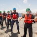 U.S. Coast Guard Cutter Stratton crew participate in a man overboard drill while patrolling the Pacific Ocean