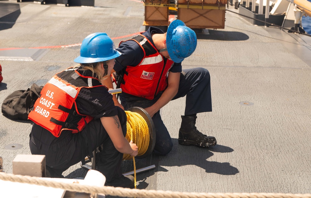 U.S. Coast Guard Cutter Stratton crew participate in a man overboard drill while patrolling the Pacific Ocean