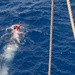 U.S. Coast Guard Cutter Stratton crew participate in a man overboard drill while patrolling the Pacific Ocean