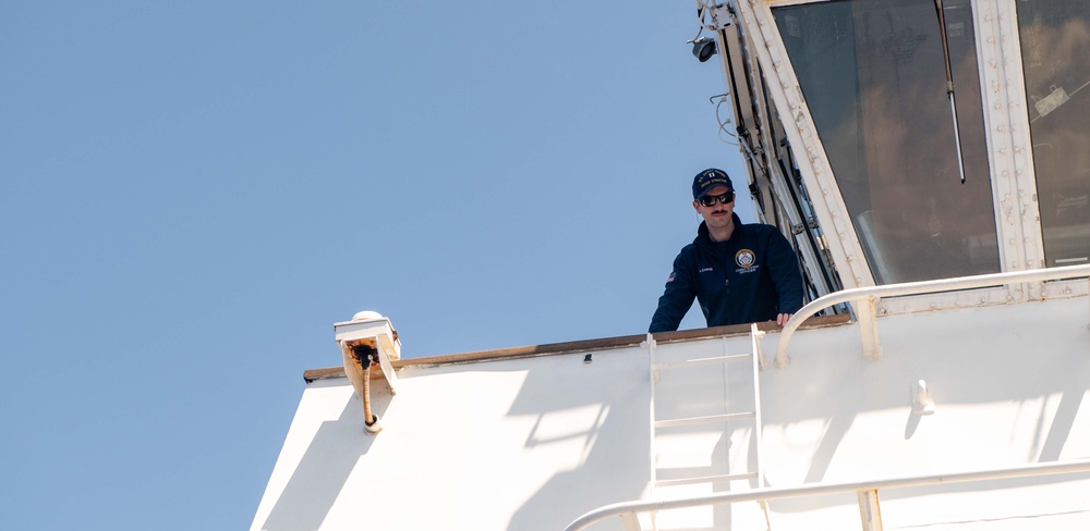 U.S. Coast Guard Cutter Stratton crew participate in a man overboard drill while patrolling the Pacific Ocean