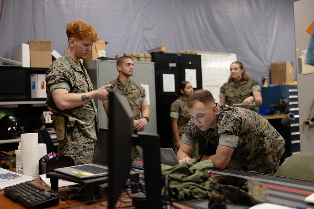 Marines with MWCS-28 conduct gear inventory