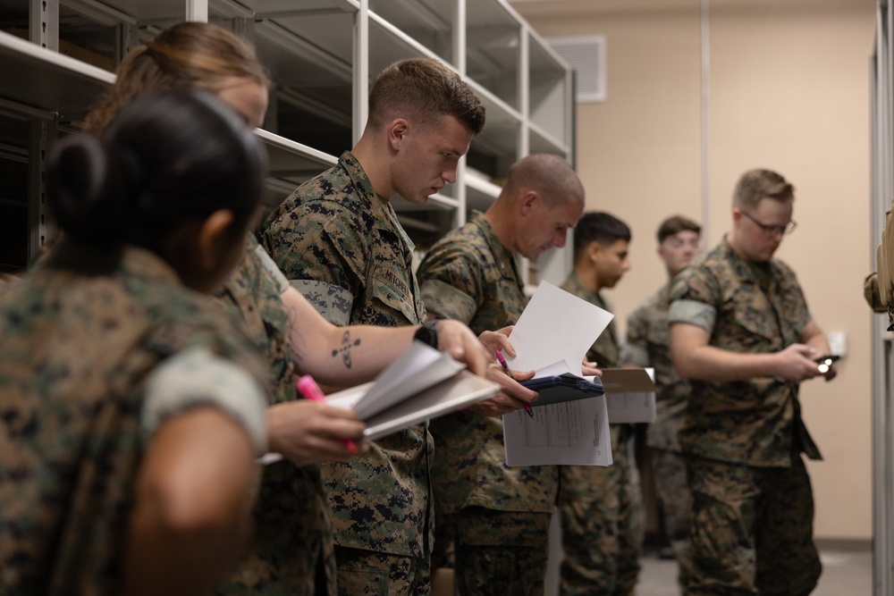 Marines with MWCS-28 conduct gear inventory