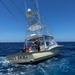 U.S. Coast Guard Station Canaveral boat crew members assist disabled vessel
