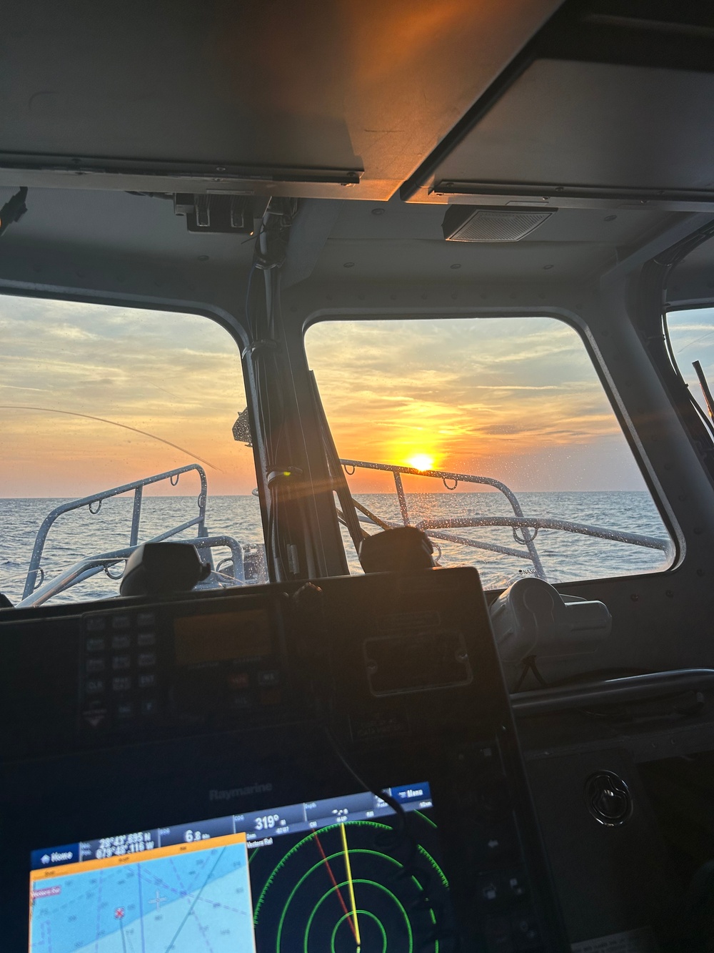 U.S. Coast Guard Station Canaveral boat crew members assist disabled vessel