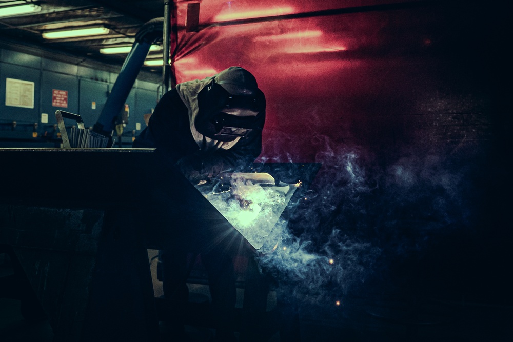 Sparks of Readiness: Welders at Work in Pearl Harbor