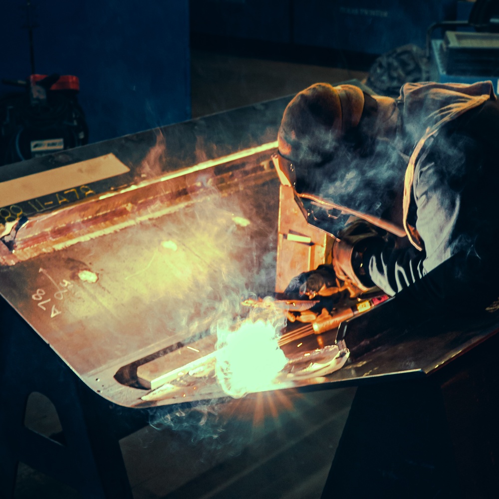 Sparks of Readiness: Welders at Work in Pearl Harbor