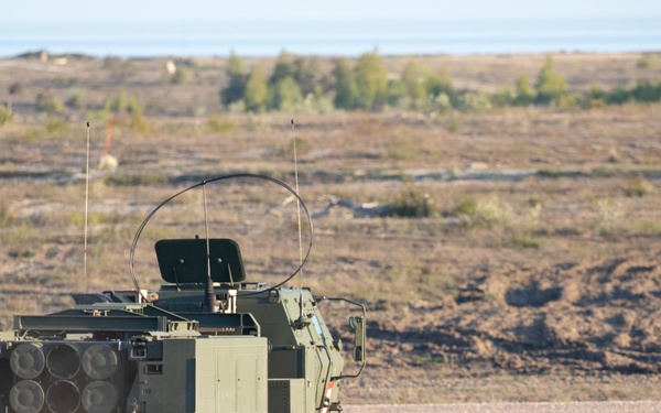 Marine Corps High Mobility Artillery Rocket System (HIMARS) in Visby, Sweden conducting joint training.