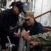 USS Kearsarge Sailors Conduct Maintenance