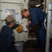 USS ESSEX SAILORS CONDUCT PRVENTATIVE MAINTENANCE ON SAFETY EQUIPMENT