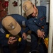USS ESSEX SAILORS CONDUCT PRVENTATIVE MAINTENANCE ON SAFETY EQUIPMENT