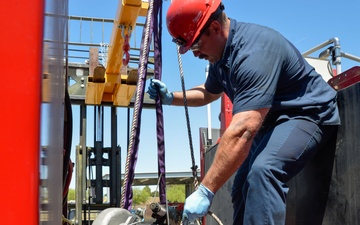 Maintenance on the OshKosh Striker 1500