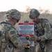 76th Engineer Company place signs along the New Mexico National Defense Area
