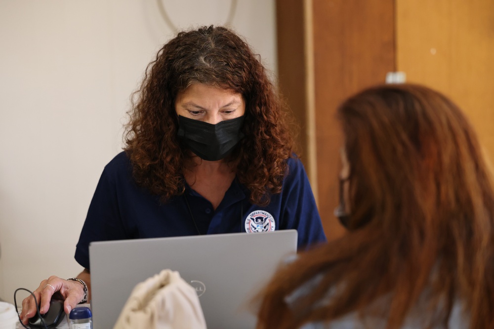 Survivors of the Arkansas severe storms and tornadoes attend FEMA Registration Event