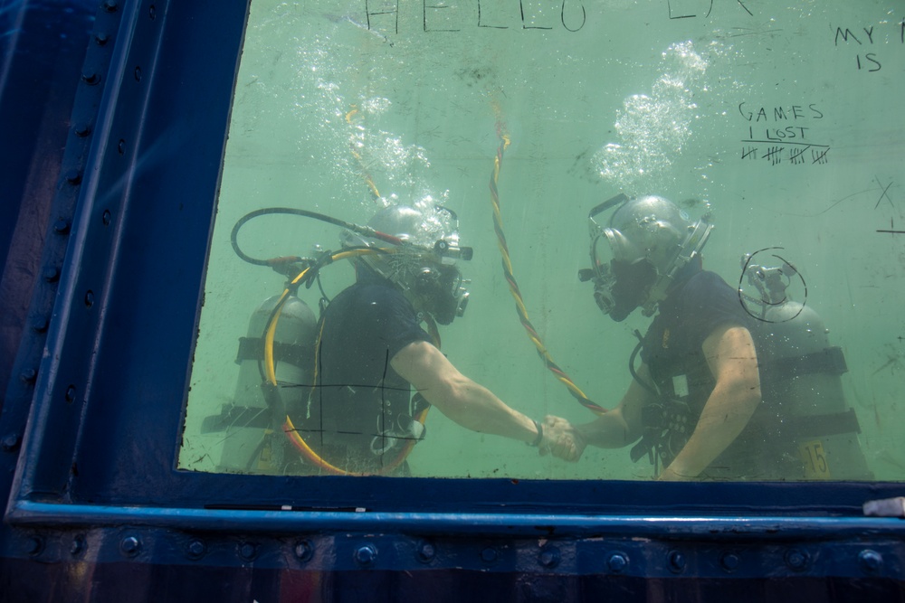 EA2 Baker Reenlists Underwater During Fleet Week 2025