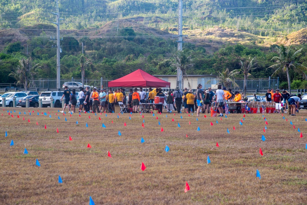 Volunteers plant flags for Memorial Day in Guam to honor heroes