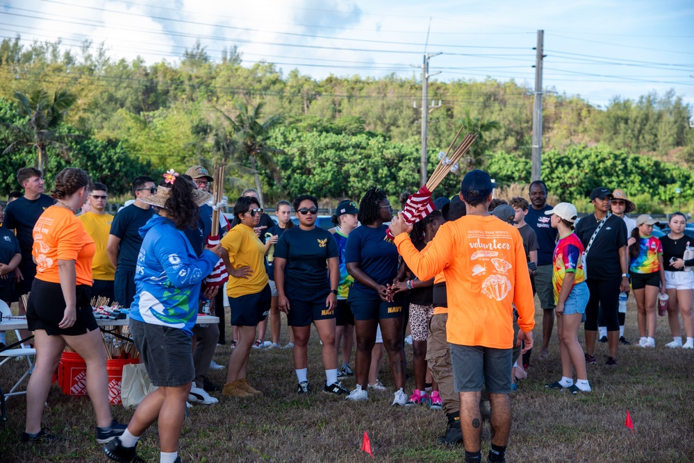 Volunteers plant flags for Memorial Day in Guam to honor heroes