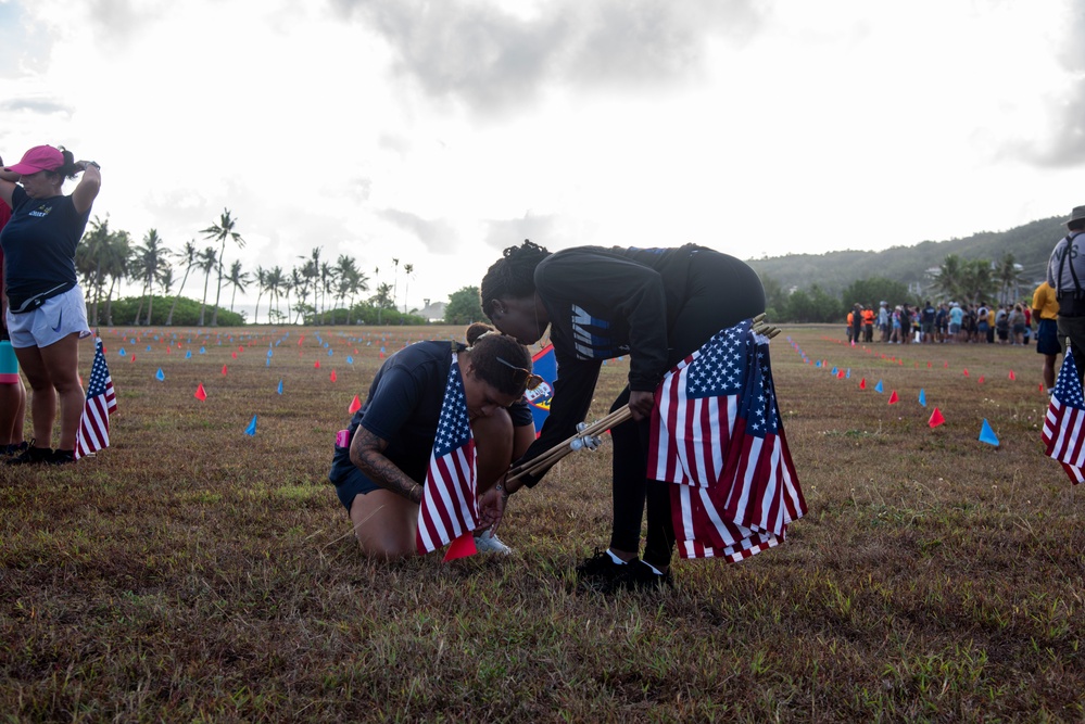 Volunteers plant flags for Memorial Day in Guam to honor heroes