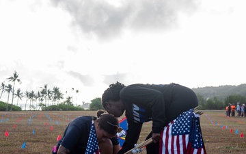 Volunteers plant flags for Memorial Day in Guam to honor heroes