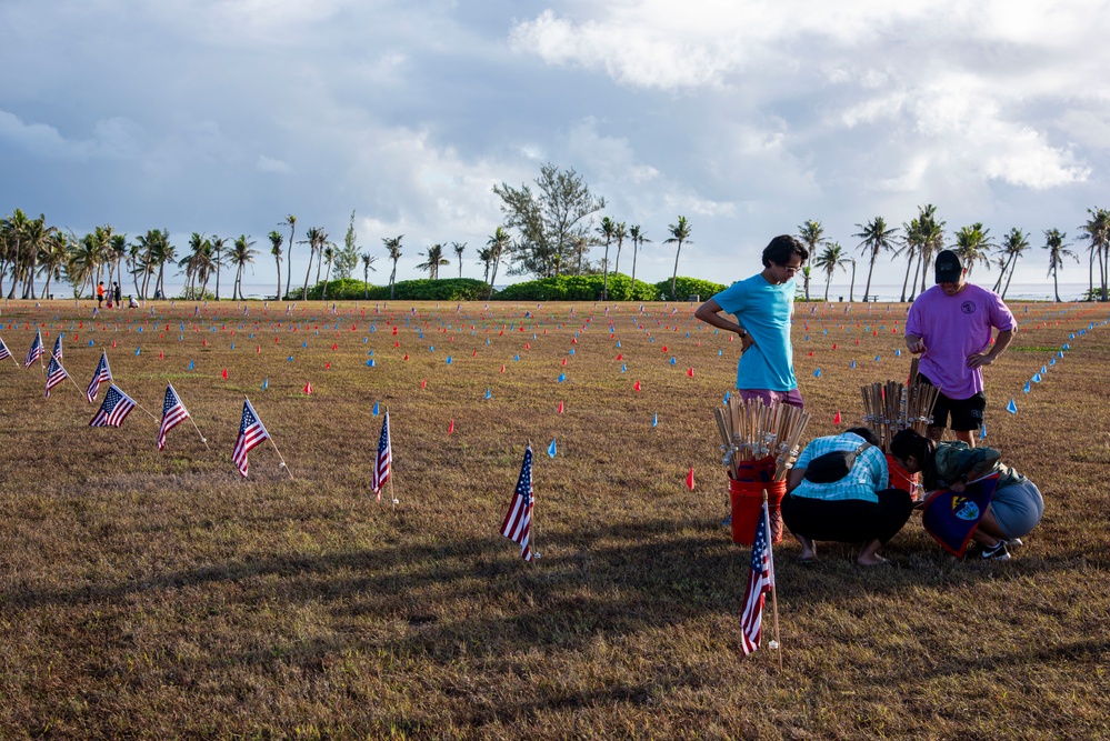 Volunteers plant flags for Memorial Day in Guam to honor heroes