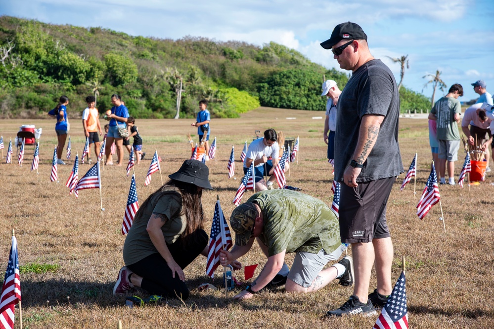 Volunteers plant flags for Memorial Day in Guam to honor heroes