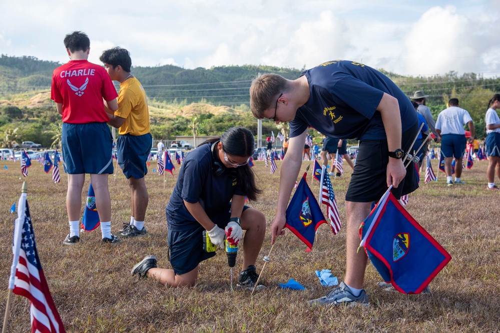 Volunteers plant flags for Memorial Day in Guam to honor heroes