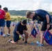 Volunteers plant flags for Memorial Day in Guam to honor heroes