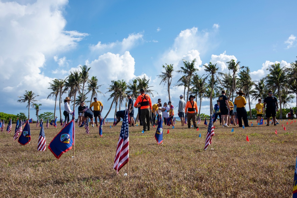Volunteers plant flags for Memorial Day in Guam to honor heroes