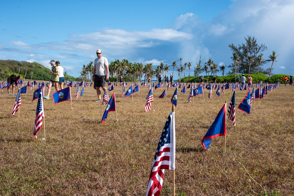 Volunteers plant flags for Memorial Day in Guam to honor heroes