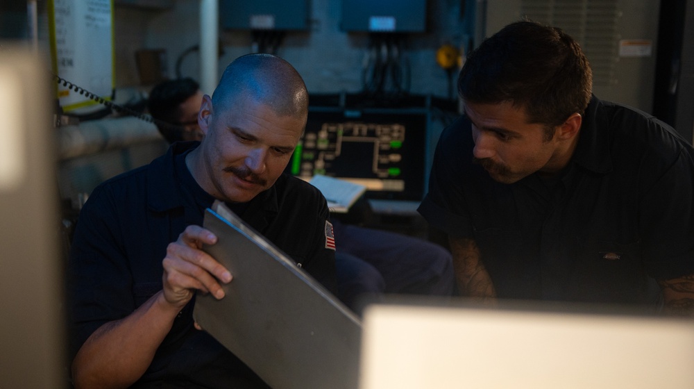U.S. Coast Guard Cutter Stratton crewmembers conduct engineering work in machinery spaces during Indo-Pacific patrol