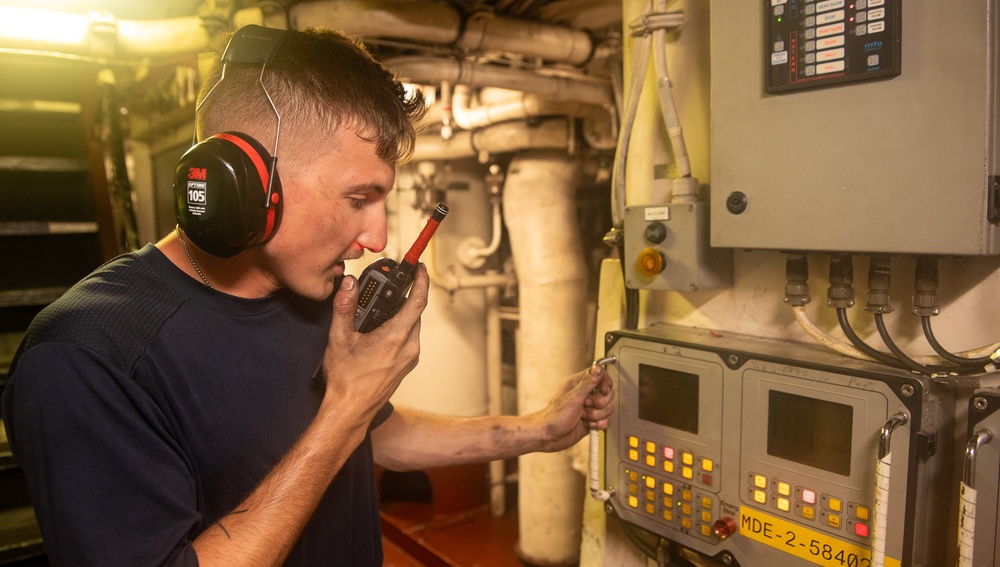U.S. Coast Guard Cutter Stratton crewmembers conduct engineering work in machinery spaces during Indo-Pacific patrol