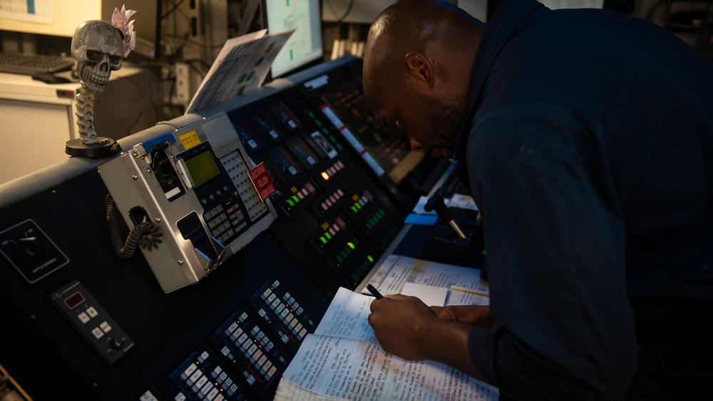 U.S. Coast Guard Cutter Stratton crewmembers conduct engineering work in machinery spaces during Indo-Pacific patrol