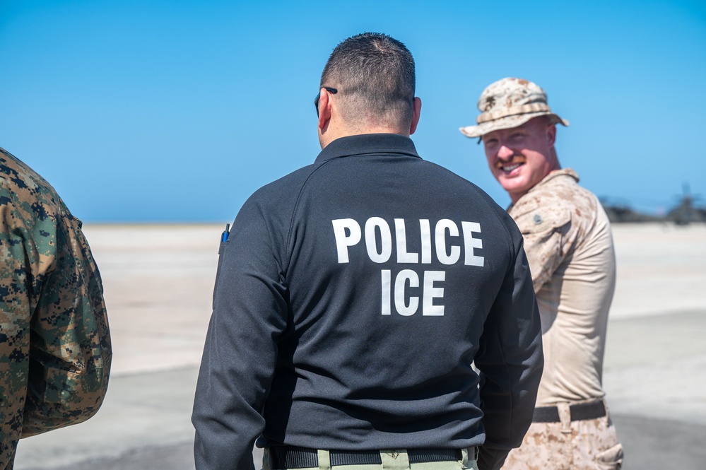 U.S. service members support interagency partners during illegal alien removal