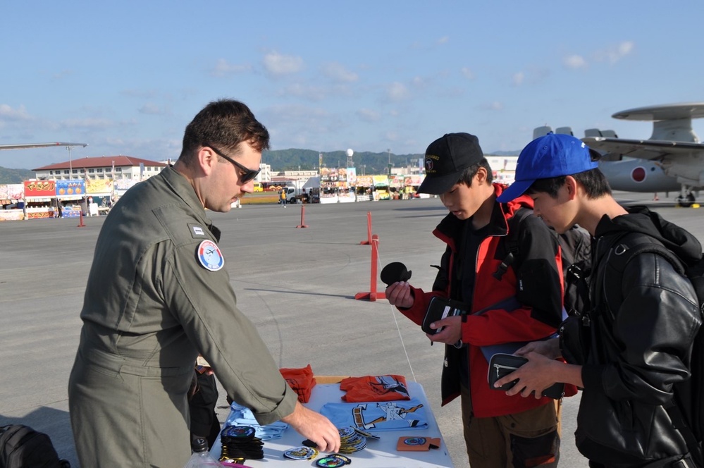 VP-8's LT Brett Burbank interacts with Japanese Locals