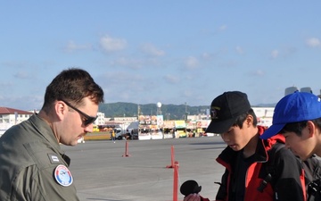 VP-8's LT Brett Burbank interacts with Japanese Locals