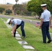 U.S. Coast Guard Academy cadets, from New London, Connecticut, place an American flag on a grave of a World War II veteran at Green Hills Memorial Park in Rancho Palos Verdes, California, May 24, 2025.