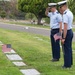 U.S. Coast Guard Academy cadets, from New London, Connecticut, salute a grave of a World War II veteran during a flag placing ceremony at Green Hills Memorial Park in Rancho Palos Verdes, California, May 24, 2025.