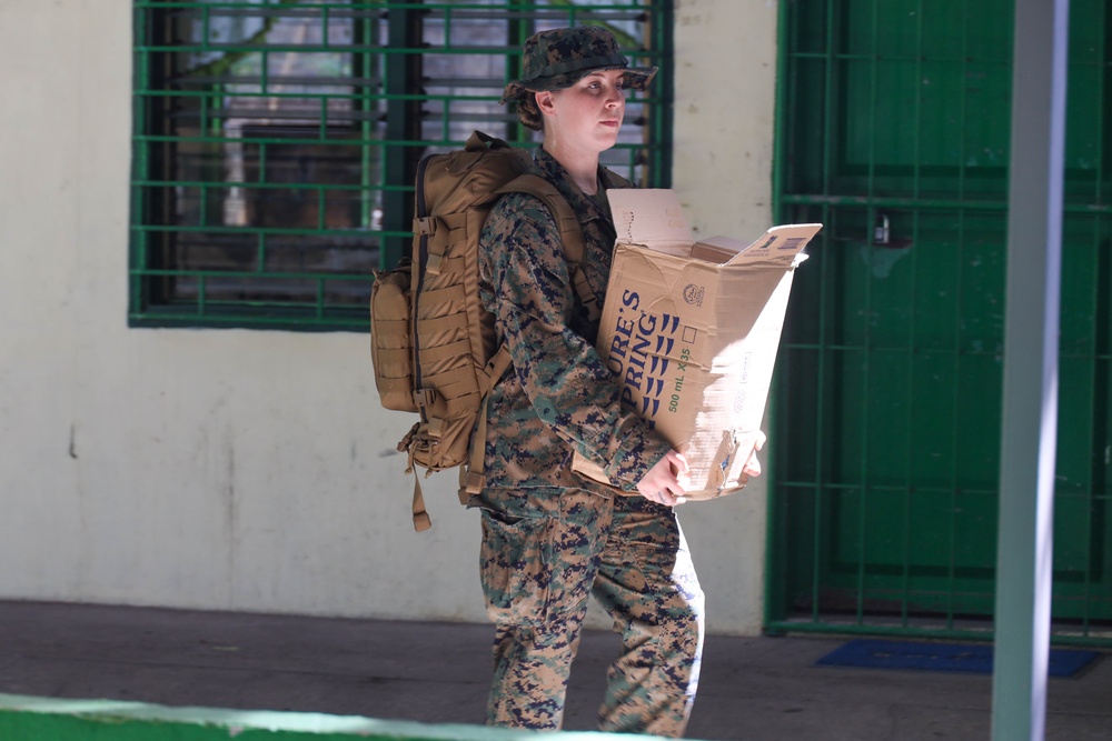KAMANDAG 9: VMM-364 and MWSS-373 participate in a community service project