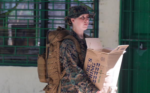 KAMANDAG 9: VMM-364 and MWSS-373 participate in a community service project