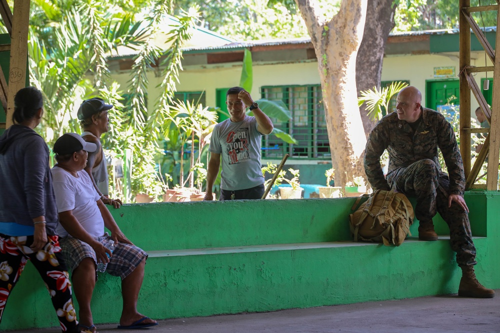 KAMANDAG 9: VMM-364 and MWSS-373 participate in a community service project