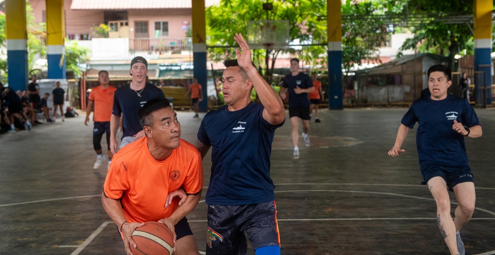 Members from the Legend-class USCGC Stratton compete in a game of basketball with Philippines Coast Guard in Puerto Princesa, Philippines